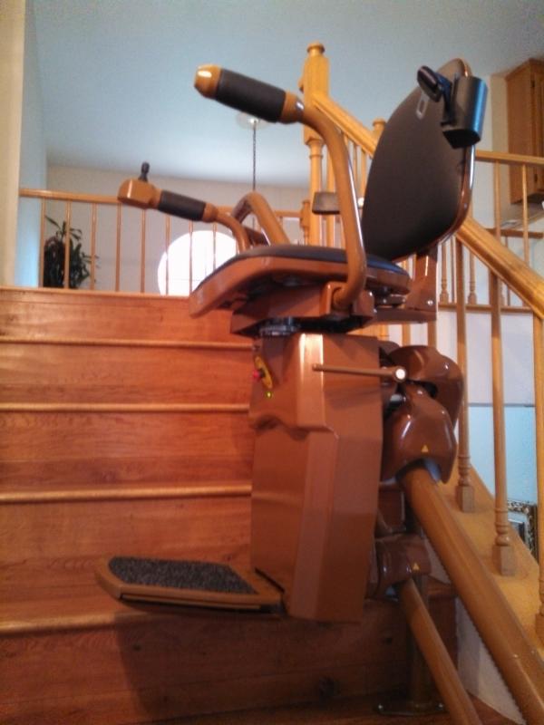 curved stair lift almost to top